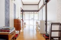 Family house プール付オーシャンビュー Amami "Birdland Nature Resort"にあるベッド