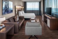 Televízia a/alebo spoločenská miestnosť v ubytovaní AC Hotel Barcelona Fórum by Marriott