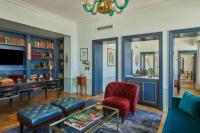 a living room with a couch and a table at Hotel Per La, Autograph Collection in Los Angeles