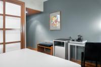 A bed or beds in a room at AC Hotel Ponferrada by Marriott