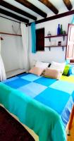 A bed or beds in a room at Casa Balcón