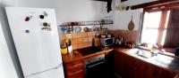 A kitchen or kitchenette at Casa Balcón