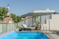 Bazén v ubytovaní AC Hotel Ciudad de Sevilla by Marriott alebo v jeho blízkosti