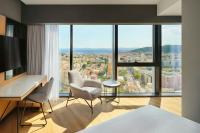 Televízia a/alebo spoločenská miestnosť v ubytovaní AC Hotel by Marriott Split