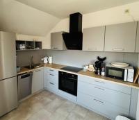 Kuchyň nebo kuchyňský kout v ubytování PREMIUM Ferienwohnung Michelau