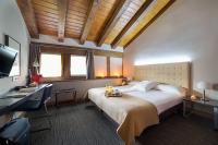Postel nebo postele na pokoji v ubytování Hotel Dolarea