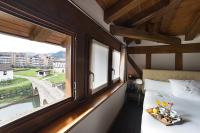 Postel nebo postele na pokoji v ubytování Hotel Dolarea