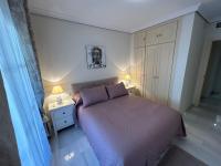 Postel nebo postele na pokoji v ubytování Elviria beach front apartment