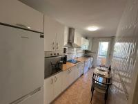 Kuchyň nebo kuchyňský kout v ubytování Elviria beach front apartment
