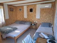 Postel nebo postele na pokoji v ubytování MERAK STD