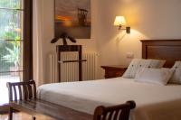 A bed or beds in a room at Villa con piscina Cala Morell