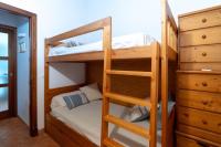 A bed or beds in a room at Villa con piscina Cala Morell