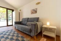 A seating area at Villa con piscina Cala Morell