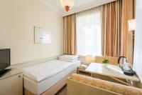 Postel nebo postele na pokoji v ubytování Hotel Scherer