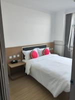 Beijing Watermelon Journey Hotel - Daxing Airportにあるベッド