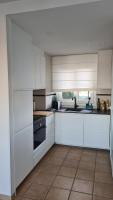 Kuchyň nebo kuchyňský kout v ubytování Moderne Penthouse-Whg am Hafen von Cala d'Or / WLAN, Klimaanlage, Pool