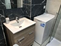 Koupelna v ubytování Apartamentos Aloe