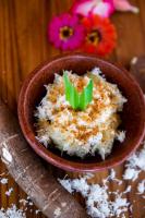a bowl of rice with a green plant in it at Golo Nuk in Komodo Labuan Bajo Airport