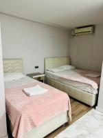 Postel nebo postele na pokoji v ubytování Dara Otel