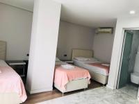 Postel nebo postele na pokoji v ubytování Dara Otel