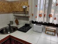 A kitchen or kitchenette at Casas Rurales Carrizosa