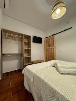 Postel nebo postele na pokoji v ubytování Apartamentos Alma de Zahara