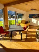 A seating area at Alpenapart Singer - contactless check-in
