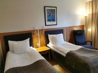 Postel nebo postele na pokoji v ubytování Finlandia Hotel Fooninki