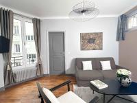 Część wypoczynkowa w obiekcie Cosy Hideaway Near Montparnasse