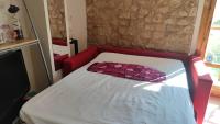 A bed or beds in a room at apartemento rural