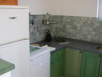Kuchyň nebo kuchyňský kout v ubytování Vis a Vis Apartments