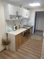 Kuchyň nebo kuchyňský kout v ubytování BNP Apartments 1