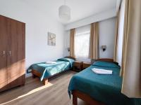 Posteľ alebo postele v izbe v ubytovaní Hotel Victoria