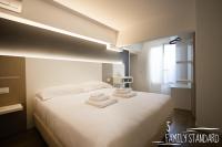 Albergo Augusta B&Bにあるベッド