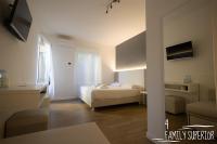 Albergo Augusta B&Bにあるベッド