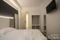 Albergo Augusta B&Bにあるベッド