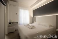 Albergo Augusta B&Bにあるベッド
