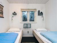 Postel nebo postele na pokoji v ubytování 5 person holiday home in Hemmet-By Traum