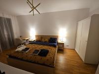Postel nebo postele na pokoji v ubytování Vltava River Apartment