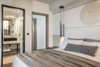 Postel nebo postele na pokoji v ubytování Helios Luxury Villas Private and Superior