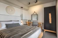 Postel nebo postele na pokoji v ubytování Helios Luxury Villas Private and Superior