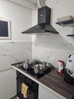 A kitchen or kitchenette at MeliKris home