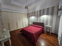 A bed or beds in a room at MeliKris home