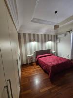 A bed or beds in a room at MeliKris home