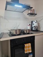 A kitchen or kitchenette at MeliKris home