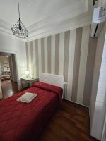 A bed or beds in a room at MeliKris home