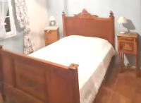 Łóżko lub łóżka w pokoju w obiekcie Villa spacieuse à Chandolas avec piscine privée
