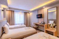 Postel nebo postele na pokoji v ubytování EViM HOTEL ÇORLU