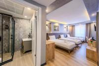 Postel nebo postele na pokoji v ubytování EViM HOTEL ÇORLU