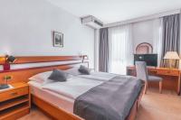 Posteľ alebo postele v izbe v ubytovaní Hotel Horizont